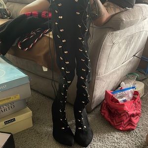 Lace up wide calf/thigh over knee boot